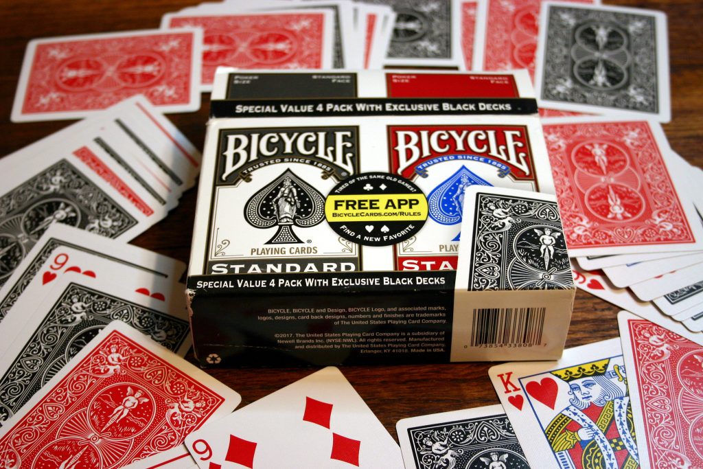 Decks of cards strewn out on the floor