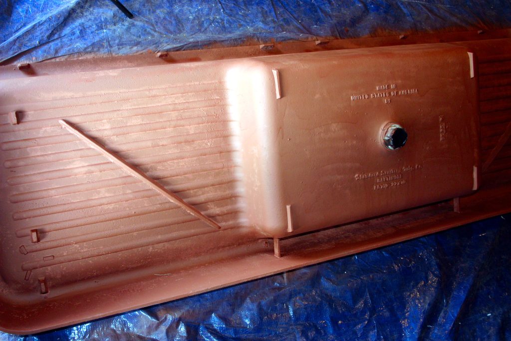 Rustoleum primer on the back of an old cast iron sink