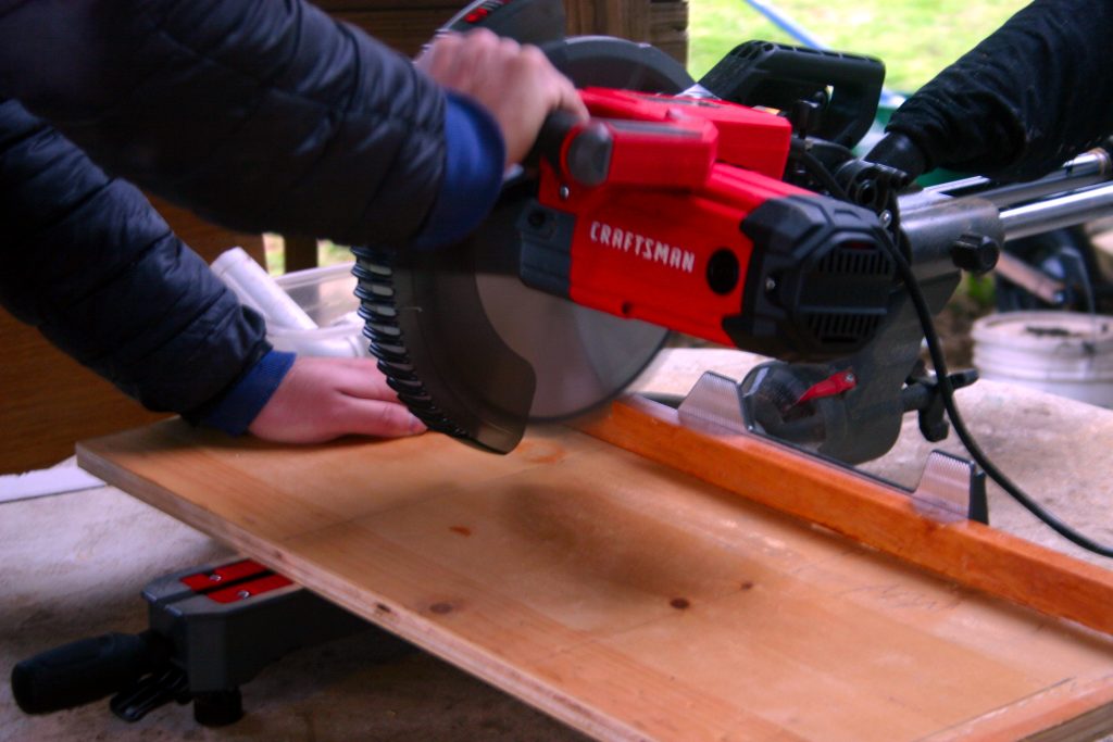 cutting wood with a miter saw