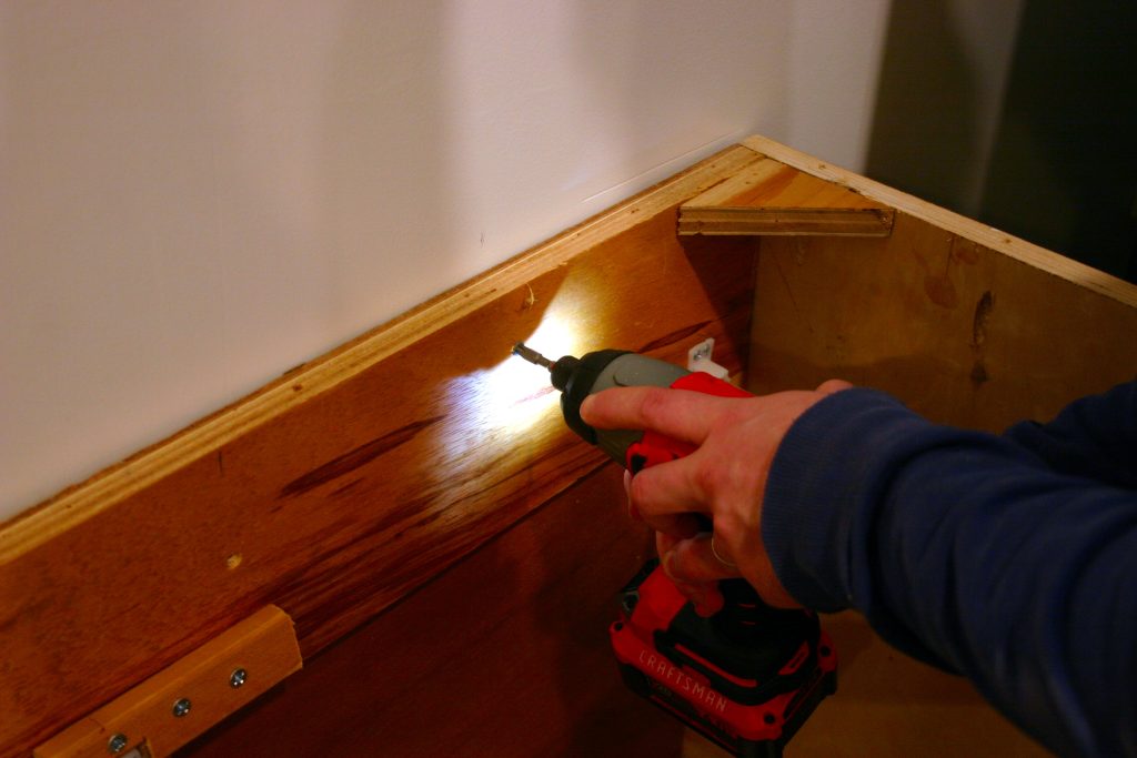 Drilling cabinets into the wall