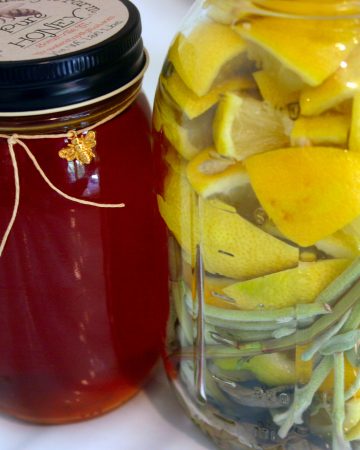 honey and a jar with lemon and herbs