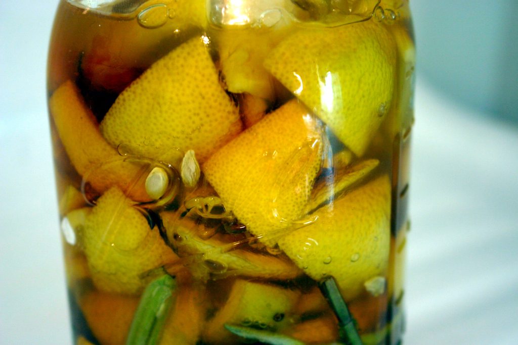 lemons and honey in a mason jar